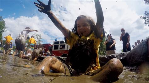 Kids make a mess in 'Muddy Puddles Project' to raise money for ...