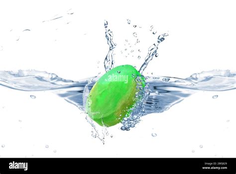 Aromatic green soap in water splash Stock Photo - Alamy