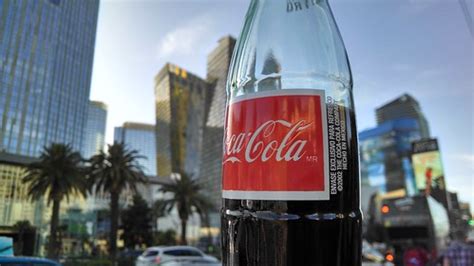 Glass Coke Bottle | Glass coke bottle seen against the city … | Flickr