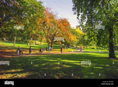 General views of Kelvingrove park Glasgow, some autumn colours and people enjoying walking or ...