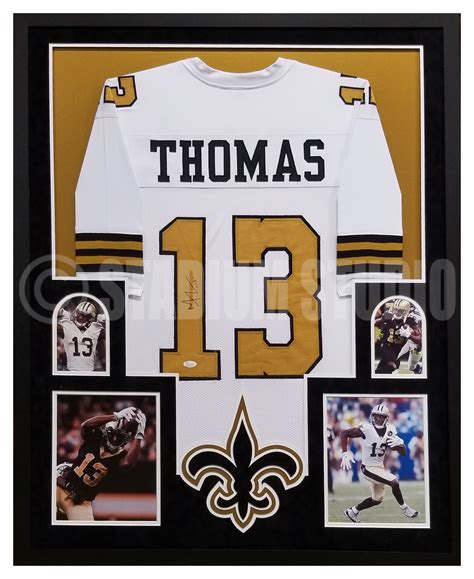 Michael Thomas Autographed Framed Saints White Jersey - The Stadium Studio