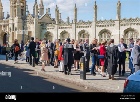 Cambridge graduation, relatives and friends of Cambridge University undergraduates queue in King ...