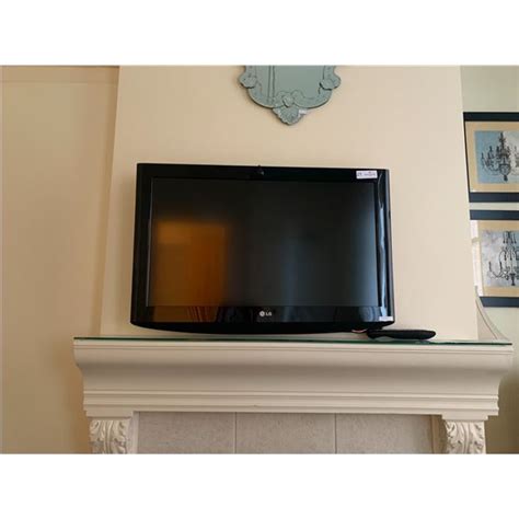 32" LG TV (Model No. 32LH250H-UA) w/ Wall Mount