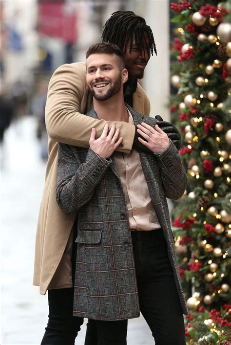 NFL Player Ryan Russell, Boyfriend Corey O'Brien Share PDA in London