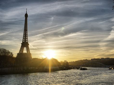 Watching the Sunset Over the River Seine, Paris, France | Go To Travel Guides