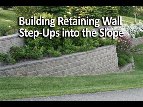 Building Retaining Wall Step-Ups into the Slope - YouTube