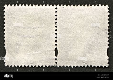 The reverse side of a postage stamp Stock Photo - Alamy