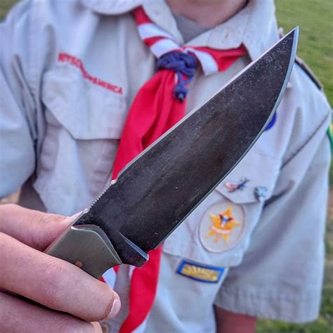 A Scout using a Scout knife! How cool is that! This is the knife in the ...