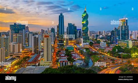 The colorful panoramic skyline of Panama City at sunset with high rise ...