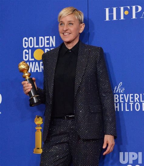 Photo: Ellen DeGeneres wins an award at the 77th Golden Globe Awards in ...