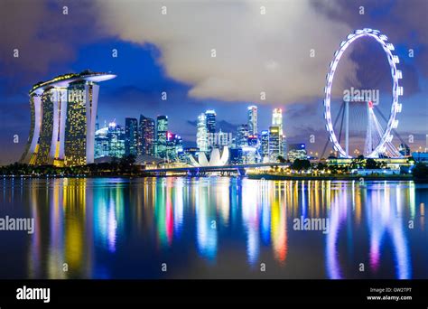 Singapore skyline at night Stock Photo - Alamy