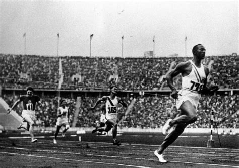 Historic photos show Jesse Owens smashing world records at Hitler's ...