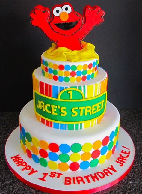 Elmo cake with stripes & polka dots. Love the colors Elmo Birthday Cake, Elmo Cake, Themed ...