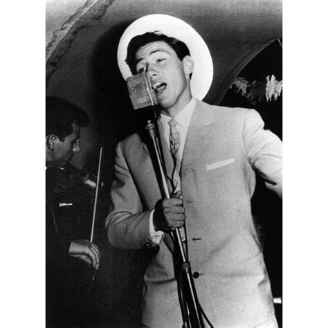 A young Silvio Berlusconi pictured singing on a cruise ship in the 1960s. He occasionally ...