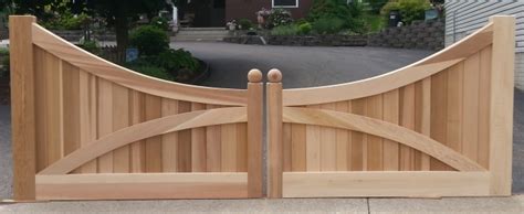 Custom driveway gates made out of Western Red Cedar | New England Woodworks