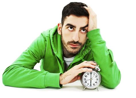 Student Tired Hold Clock, Sitting at the Desk, Looking Up. Stock Photo - Image of desk ...