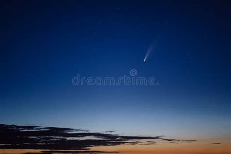 Comet in the Night Sky at Sunset Stock Photo - Image of light ...