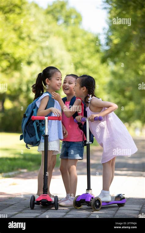 Happy children playing outdoors Stock Photo - Alamy