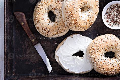 Everything bagels with cream cheese 15694195 Stock Photo at Vecteezy