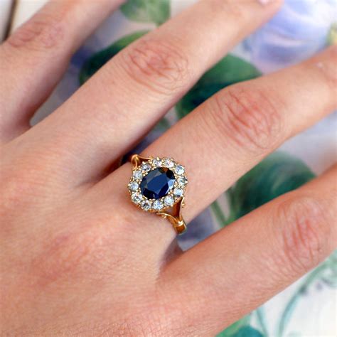 1911 Antique Sapphire Ring with Diamond Halo — Heart of Hearts Jewels