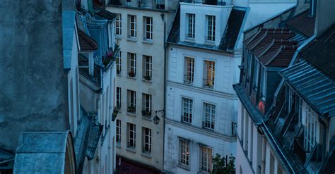 Evening street with outdoor cafe in Paris · Free Stock Photo