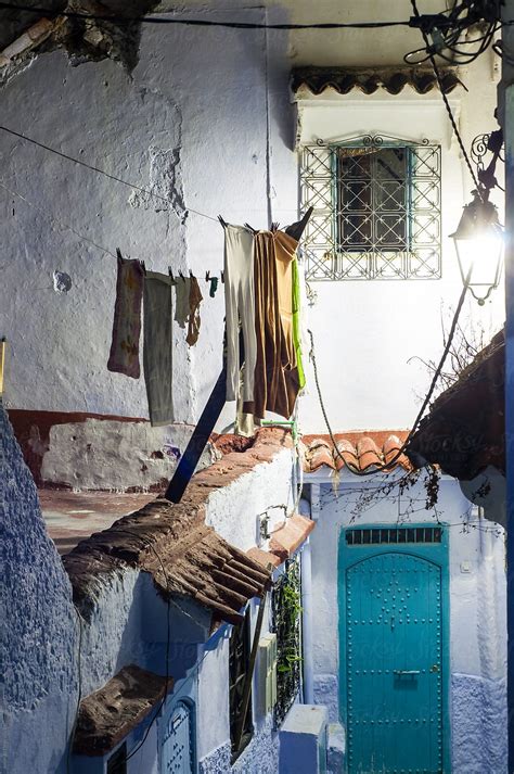 "Chefchaouen Night Scene With Laundry." by Stocksy Contributor "Amanda Large" - Stocksy