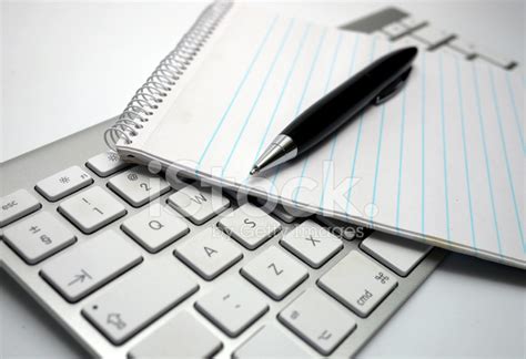 Writing Pad and Pen on Keyboard Stock Photos - FreeImages.com