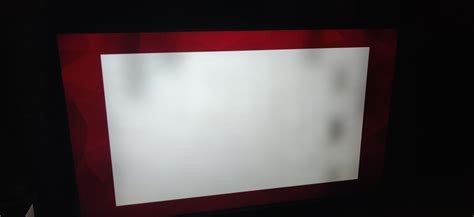 Just bought a TCL 6-series 4K TV and noticed these black splotches. I'm ...