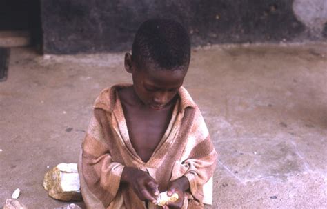 Young boy learning how to make stone tools, Kamabai, Sierr… | Flickr