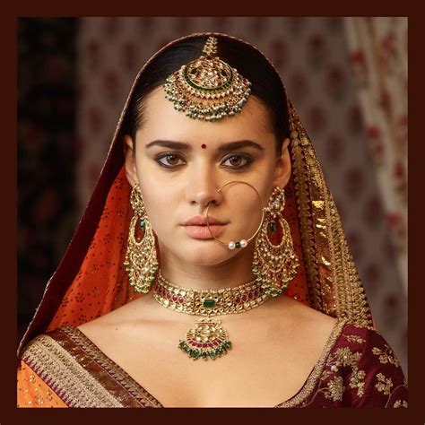 The classic sabyasachi sangeet jewelry. Made in 22k gold with uncut diamonds, emeralds, rubies ...