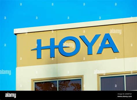 Hoya sign, logo on the facade of Hoya Corporation a Japanese company manufacturing optical ...