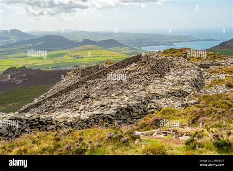 The walls to the Iron Age hill fort of Tre'r Ceiri on the Llyn Peninsula Gwynedd North Wales ...