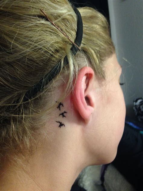 Birds behind the ear tattoo | Behind ear tattoos, Small neck tattoos, Small girl tattoos