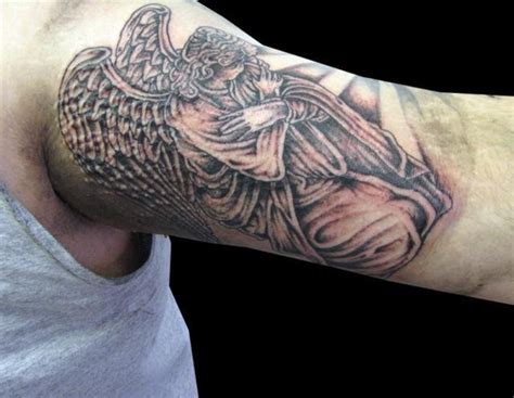 Kneeling angel tattoo on half sleeve - Tattooimages.biz