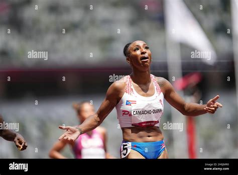 Jasmine Camacho-Quinn running and winning in the final of the 100 meter hurdles at the 2020 ...