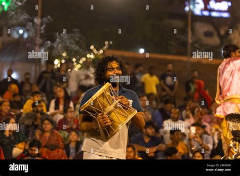 Ganga aarti, Portrait of an young priest performing river ganges ...