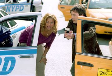 Taxi movie review & film summary (2004) | Roger Ebert