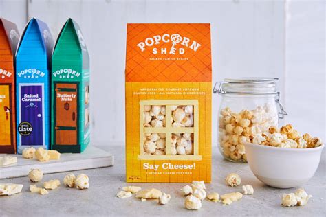 Popcorn Shed's Gourmet Popcorn Sheds - World Brand Design | Gourmet popcorn, Cheese popcorn ...