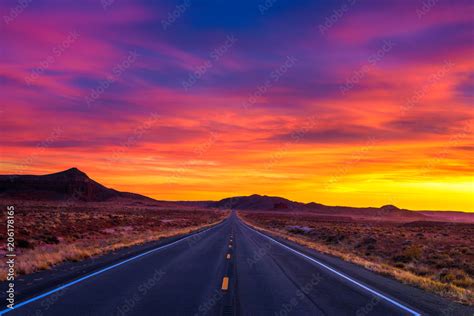 Dramatic sunset over an empty road in Utah Stock Photo | Adobe Stock