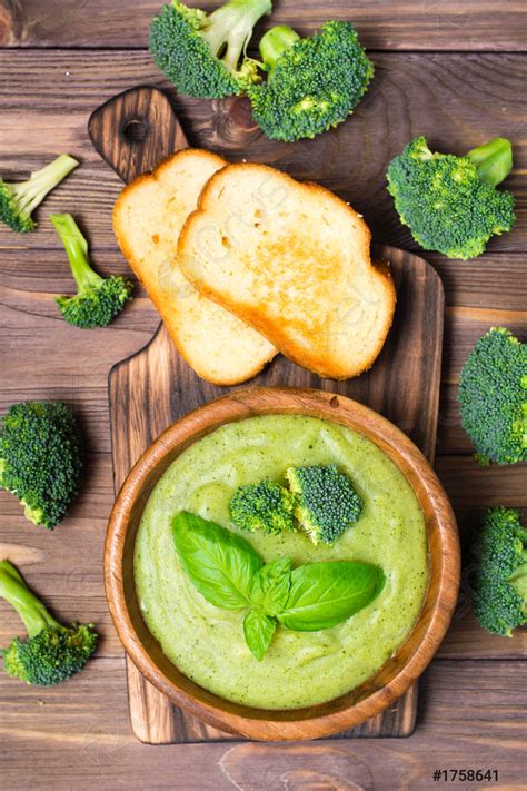 Ready to eat fresh hot broccoli puree soup with slices - stock photo ...