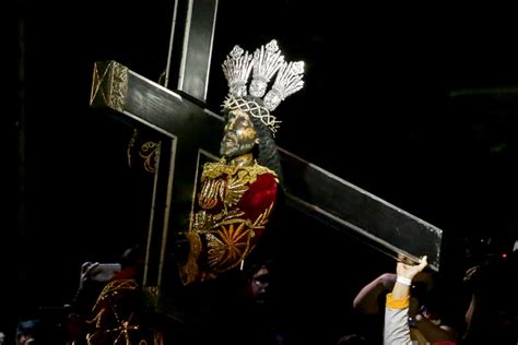 The Black Nazarene statue is carried by pilgrims during celebrations in Manila Jan. 9, 2020 ...