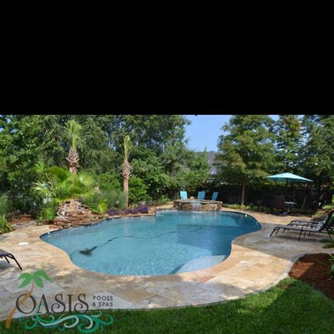 Beautiful Lagoon Shaped Pool in Mandeville, LA by Oasis Pools and Spas ...