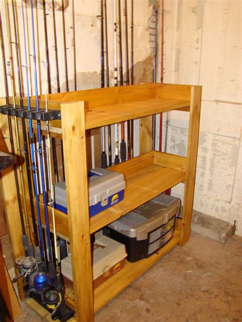 This, but smaller footprint and taller for more shelves | Fishing pole rack, Diy fishing rod ...