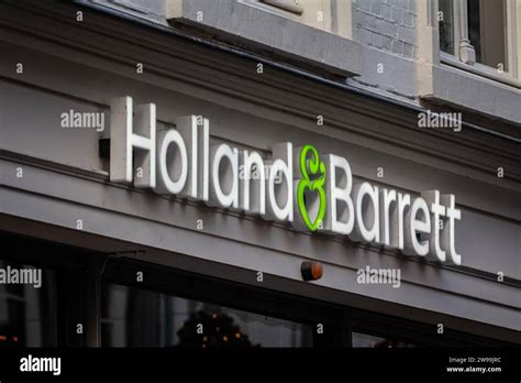 Picture of a sign with the logo of Holland and Barrett on Maastricht. Holland & Barrett (H&B) is ...