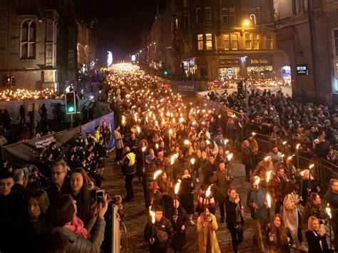 In Pictures: Torchlight procession kicks off Hogmanay celebrations ...