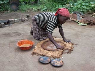 Plate Maker | A woman fashions an injera.baking plate in an … | Flickr