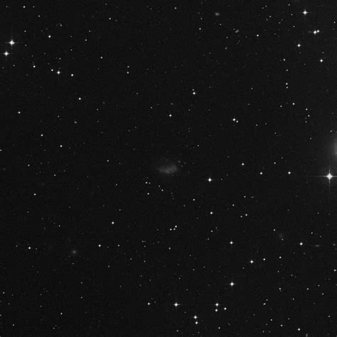 NGC 1427A - Irregular Galaxy in Fornax | TheSkyLive.com