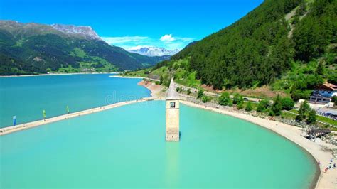 Church Tower in Lake Reschen - South Tyrol - Italy - 4k Drone Photo Stock Image - Image of ...