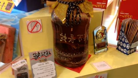 Enjoying some delicious Habu Snake venom Liqueur, out in Okinawa : japanpics