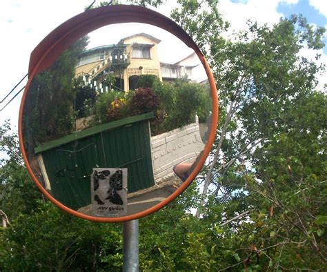 Blind corner mirror and reflection of house on Cowlishaw St - Bowen ...